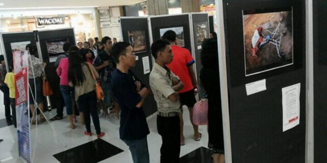 Tangisan Pengunjung Hiasi Pameran Foto Banjir Manado di Mantos